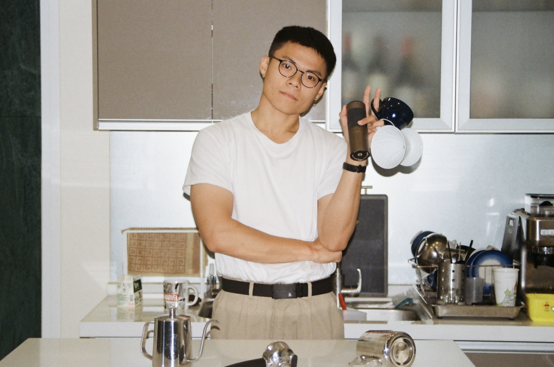 Angelo preparing coffee in a kitchen